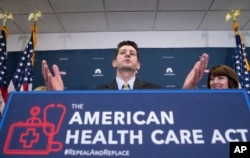 House Speaker Paul Ryan of Wisconsin, accompanied by Rep. Cathy McMorris Rodgers, R-Wash., right, speaks at a news conference following a GOP party conference at the Capitol in Washington, March 15, 2017.