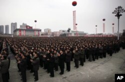 North Koreans gather at the Kim Il Sung Square to celebrate a satellite launch, Feb. 8, 2016, in Pyongyang, North Korea.