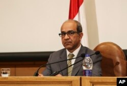 Ayman al-Muqaddam, the head of the investigation team on a Russian plane crash last week in Egypt's Sinai, speaks to news media at the Aviation Ministry in Cairo, Egypt, Nov. 7, 2015.