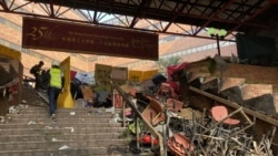 香港理工大學校園經過連日激烈警民攻防戰，其中一個主要入口變成一片廢墟。(攝影: 美國之音湯惠芸）