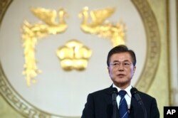 South Korean President Moon Jae-in speaks during a press conference marking his first 100 days in office at the presidential house in Seoul, Aug. 17, 2017.