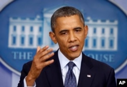 FILE: Then-President Barack Obama speaks about the government shutdown and debt limit, in the James Brady Press Briefing Room of the White House in Washington, Oct. 8, 2013.