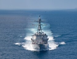 美國海軍公佈的照片顯示“基德”號驅逐艦在當地時間2021年8月27日例行穿越台灣海峽的國際水域。