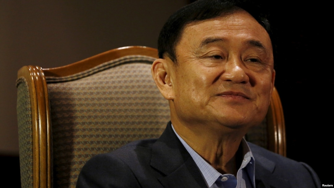 FILE - Former Thai Prime Minister Thaksin Shinawatra speaks to Reuters during an interview in Singapore, Feb. 23, 2016.
