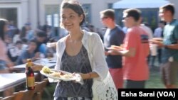 International students from around the world -- like Arina Zaytseva, a Ph.D. candidate in religious studies from Russia -- are starting schools at colleges and universities around the U.S. To help them understand insurance requirements and visa specifications, schools like Rice University in Houston, Texas, bring them together for food and drink, too.
