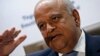 South Africa's Finance Minister Pravin Gordhan gestures during a media briefing after he was reappointed to the position by President Jacob Zuma in Pretoria, Dec. 14, 2015. 