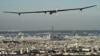 Solar Impulse flying over Paris in 2011. (© Solar Impulse | Jean Revillard )