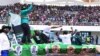 FILE - Incumbent Zambian President Edgar Lungu supporters cheer on May 21, 2016 at the Heroes Stadium in Lusaka during the launching of his re-election campaign ahead of polling day on August 11. 