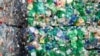 Bundles of pressed PET (polyethylene terephthalate) bottles made out of plastic. - RTS275CP