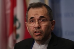 FILE - Iranian Ambassador to the United Nations Majid Takht-Ravanchi speaks to the media outside Security Council chambers at the U.N. headquarters in New York, June 24, 2019.