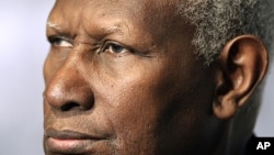 Abdou Diouf, Secretary General of the International Francophone Organization, looks on during the closing news conference, File October 24, 2010.