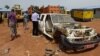 Vehicles that have been stripped for parts during looting at the China International Fund depot in Bangui, March 4, 2014. (Nick Long/VOA)