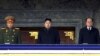 2011년 12월 평양 김일성 광장에서 열린 부친 김정일 위원장의 추도대회에 참석한 김정은 북한 국방위원회 제1위원장(가운데). (자료사진)