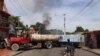 Haitians flee homes from gang violence, in Port-au-Prince