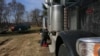 Todd Schmitz, a truck driver works on is truck at his home in Boscobel, Wisc. (D.Dobhal/VOA)