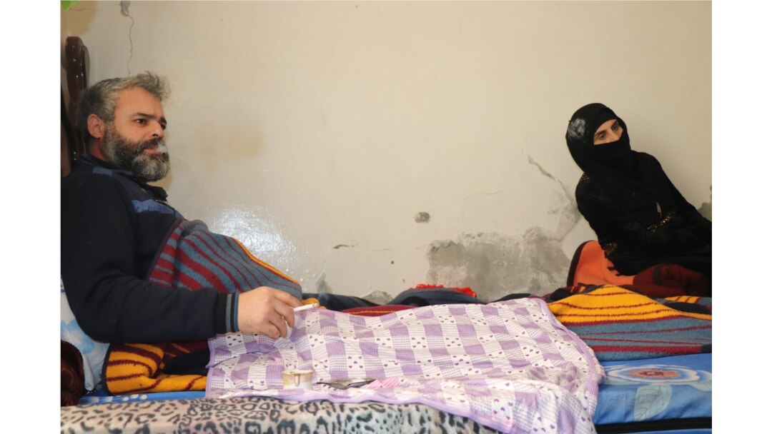 Deeb Zara'a, paralyzed from the waist down after being hit by shrapnel in a battle with IS militants, is pictured in Raqqa, Syria, Feb. 22, 2020. (Heather Murdock/VOA)