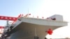 China Luncurkan Kapal Serbu Baru dan Jet Tempur Futuristis