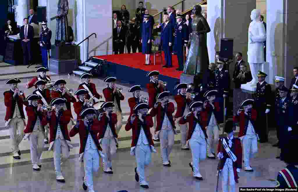 President Donald J Trump participates in a Reviewing the Troops Ceremony as part of his Inaugural activities in Emancipation Hall in the United States Capitol in Washington, Jan. 20, 2025.