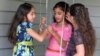  American Muslims girls are seen celebrating Eid al-Fitr in northern Virginia August 8, 2013 (Mohamed Elshinnawi/VOA). 