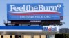 FILE - This April 1, 2016 file photos shows a billboard above a gas station that reads "Feel The Burn," a play on then-presidential candidate Bernie Sanders' campaign slogan, "Feel The Bern." It's actually promoting testing for sexually transmitted diseases.