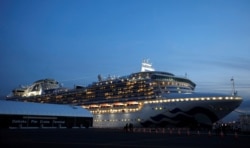 The cruise ship Diamond Princess, where 10 more people were tested positive for coronavirus on Thursday, is seen at Daikoku Pier Cruise Terminal in Yokohama, south of Tokyo, Japan, Feb. 7, 2020.