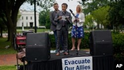 Abdul Wahid Forozan, a former translator for the American military in Afghanistan, joined by Chris Purdy, the Project Manager of the Veterans for American Ideals program at Human Rights First, left, And and Jill Marie Bussey, Director for Public…