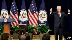 Secretary of State Rex Tillerson gives the thumbs-up as he arrives to speak to State Department employees, May 3, 2017, at the State Department in Washington. 