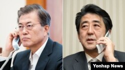 문재인 한국 대통령이 7일 청와대에서 아베 신조 일본 총리와 통화하고 있다. 아베 신조 총리 통화모습은 자료사진.