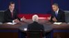 Republican presidential nominee Mitt Romney and President Obama answer a question during the third presidential debate focused mostly on the Middle East, October 22