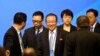 2013年9月18日，朝鲜第一副外相金桂冠（中）抵达在北京钓鱼台国宾馆参加六方会谈开启10周年论坛会的开幕式。

