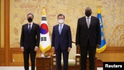 韓國總統文在寅2021年3月18日在首爾會見到訪的美國國務卿布林肯和國防部長奧斯汀（路透社）