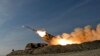 Foto yang dirilis oleh tentara Iran pada 19 Januari 2024, menunjukkan sebuah rudal diluncurkan dari wilayah selatan Iran dalam latihan militer yang dilakukan oleh pasukan Iran. (Foto: Iranian Army via AP)