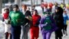 Runners in costume train for the Boston Marathon in Newton, Massachusetts, March 1, 2014.