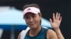 FILE - China's Peng Shuai waves after losing to Canada Eugenie Bouchard in their first round match at the Australian Open tennis championships in Melbourne, Australia on Jan. 15, 2019