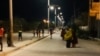 Residents run on an empty street during hours when exercise is allowed, amid a nationwide lockdown due to the coronavirus pandemic, in Mogadishu, Somalia. (Courtesy photo)