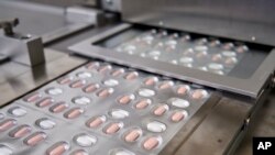 Pil percobaan untuk obat COVID-19 produksi Pfizer. 