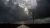 Rain before the arrival of what became Tropical Storm Humberto falls on the windshield of a car in the aftermath of Hurricane Dorian at Mclean's Town, Grand Bahama, Bahamas, Sept. 13, 2019.