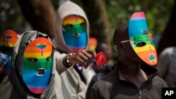 Kenya gay and lesbian activists conceal their identity at a demonstration at Uganda High Commission in Nairobi on February 10 to protest a wave of laws against homosexuality in African countries. 