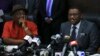 Nigeria's Minister of Health Onyebuchi Chukwu (R) speaks at a media briefing about the Ebola outbreak in Nigeria, while Interior Minister Abba Moro looks on, at the health minister's office in Abuja, Nigeria, August 14, 2014.