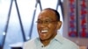 FILE - Indonesian President candidate from Golkar Party Aburizal Bakrie gestures during an interview in Jakarta, Dec. 12, 2013.
