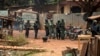 MISCA military soldiers check houses during an operation in the Boy-rabe neighborhood of Bangui, Central African Republic, Feb. 15, 2014.
