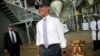 U.S. President Barack Obama laughs after commenting on his press corps, who were wearing hair nets on a tour of the Faffa Food factory in Addis Ababa, Ethiopia, July 28, 2015.