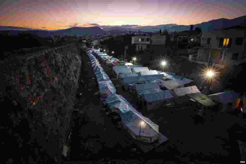 The old walls of a castle overlooking Souda camp in Chios. Big rocks were thrown from these walls on the people below in two nights of attacks. There are claims molotov cocktails were thrown too. Those present say it is pure chance no one was killed. (J.