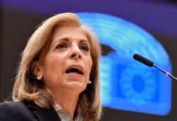 EU Commissioner for Health Stella Kyriakides talks during a plenary session on EU global strategy on COVID-19 vaccinations at the EU parliament in Brussels, Belgium, Jan. 19, 2021.
