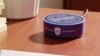 The Alexa Echo Dot devices include the official Saint Louis University logo and are equipped with specific skills to provide information on local events and campus life. (Screengrab for Saint Louis University Video)
