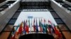 Flags are seen inside the European Council headquarters on the eve of a EU Summit in Brussels, Belgium, Dec. 14, 2016. 