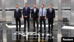 The main candidates for the Spanish general elections pose before a televised debate in Madrid, Spain, Nov. 4, 2019. 