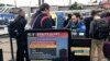 Companies Trim Outlooks, Travel and Staff as Virus Spreads
