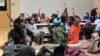 Thirty youngsters are eager to share with the group at Genesis Youth Foundation's nightly gathering in Des Moines, Iowa, Jan. 28, 2019.