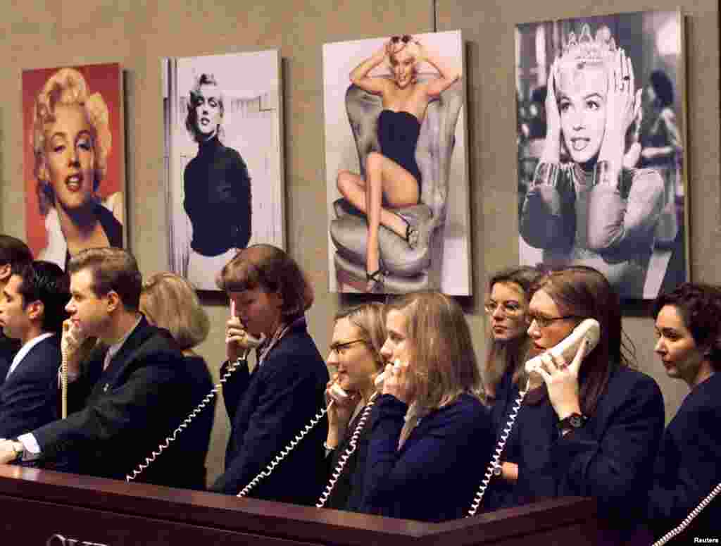 Telephone bids are taken at Christie's auction of the personal property of Marilyn Monroe in New York on Oct. 27, 1999.